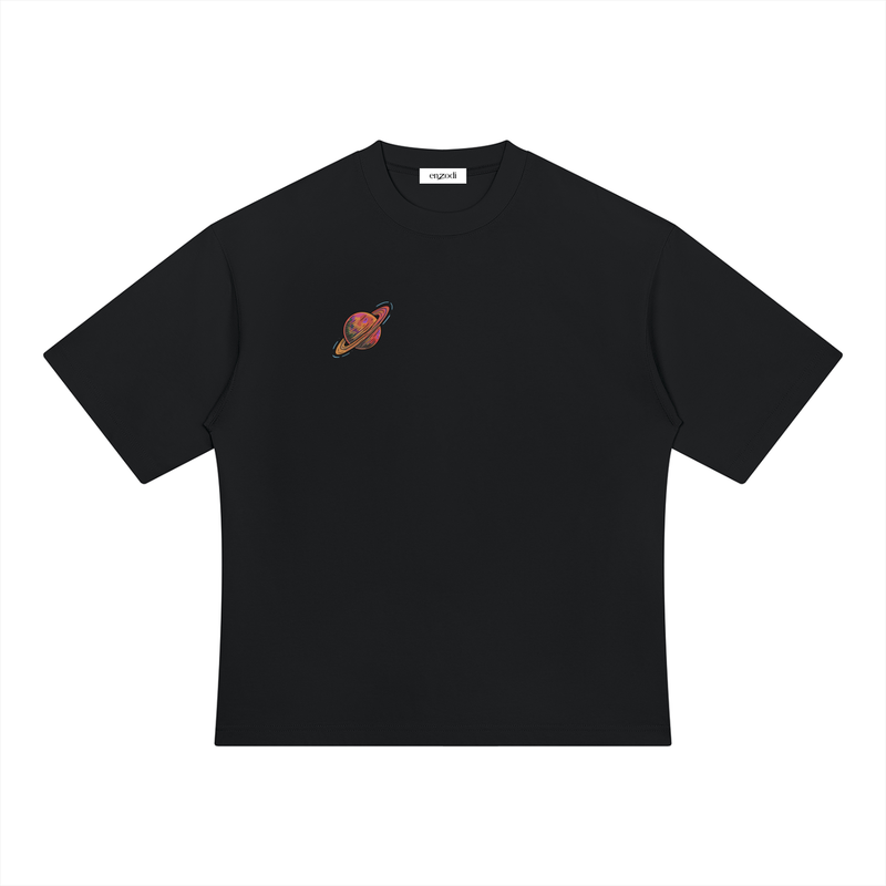 A black short-sleeve crewneck t-shirt with a small colorful graphic of a planet on the left chest, displayed flat against a solid white background.