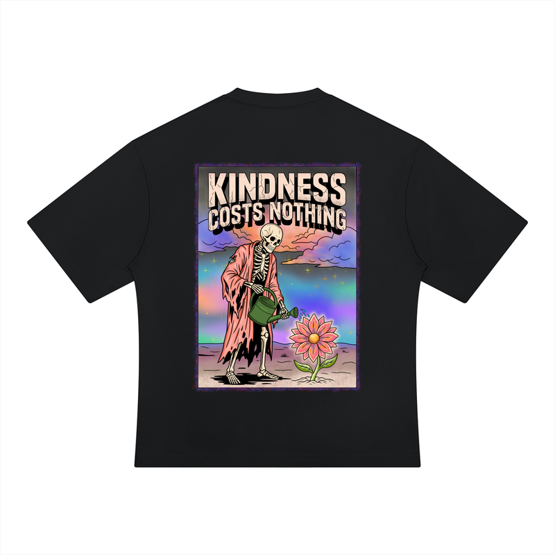 A black short-sleeve t-shirt shown flat against a white background, displaying a large graphic print on the back. The graphic features a skeleton watering a pink flower under the text 'KINDNESS COSTS NOTHING' in a distressed cream font.